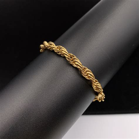 givenchy twisted gold tone bracelet|givenchy gold tone necklace.